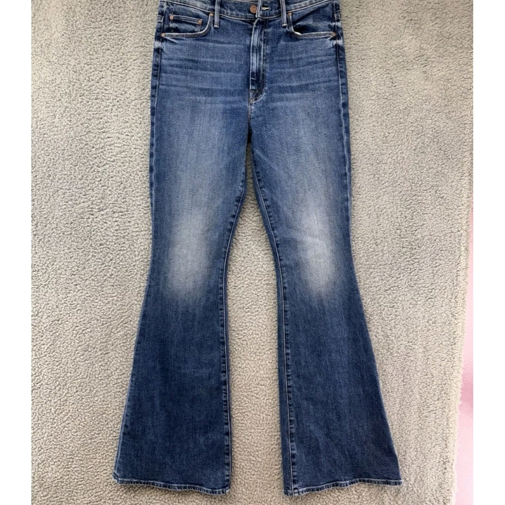 MOTHER Blue Flare Jeans with Classic Medium Wash and Subtle Fading